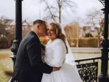 Couple kissing at the Band Stand