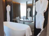 Bathroom set up with 2 robes