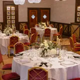tables and plate settings for a wedding evening meal at boclair house