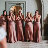 Bridesmaids getting first look at the bride