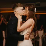 Couple kissing on dancefloor