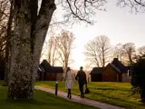 Couple walking through grounds at the Lodge