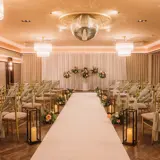 The Grand Ballroom at The Redhurst Hotel set for a wedding ceremony