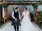 Couple walking at The Garden House