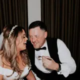 Married couple sharing a secret