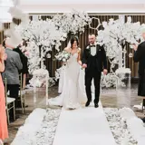Couple walking down the aisle