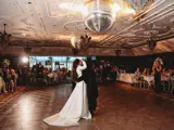 Couple kissingafter their first dance