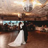 Couple kissingafter their first dance