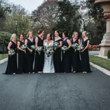 Bride and Bridesmaids outside of the castle