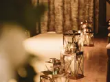 Interior of the Boclair House Grand Ballroom showcasing ornate lanterns, set up for an exclusive-use wedding ceremony in Bearsden, Glasgow