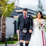 Couple walking in sunshine