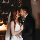 Couple sharing a moment in thehoneymoon suite at Cornhill Castle
