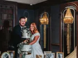 Couple cutting their cake