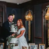Couple cutting their cake