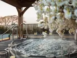 outdoor hydrotherapy pool at bowfield luxury spa in scotland