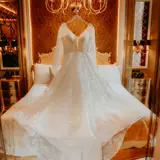 Wedding dress hanging up in Honeymoon Suite