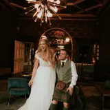 Couple in bar after wedding