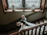 Bride and father walking down stairs in Cornhill Castle