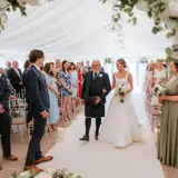 father giving his daughter away to her new husband