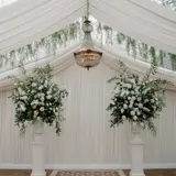 Flowers next to aisle