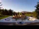Couple in hot tub at the lodge 