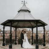 Couple kissing at the Band Stand