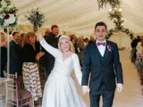 Couple just married walking down the aisle