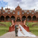photoshoot of married couple in front of boclair house hotel & gardens