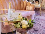 Couch and table with Prosecco