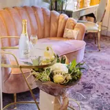 Couch and table with Prosecco