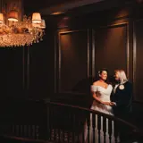 Couple kissing in the stairwell