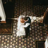 Ariel shot of couple in the hallway at Boclair House