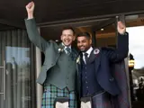 Male couple celebrating getting married