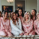 Bride and Bridesmaid on the bed