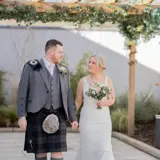 Couple walking in the Garden of The Garden House