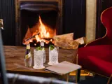 Drinks in front of a Fireplace