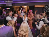 Bride and groom on the dancefloor in The Grand Ballroom at Redhurst Hotel