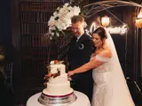 couple cutting cake
