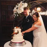 couple cutting cake