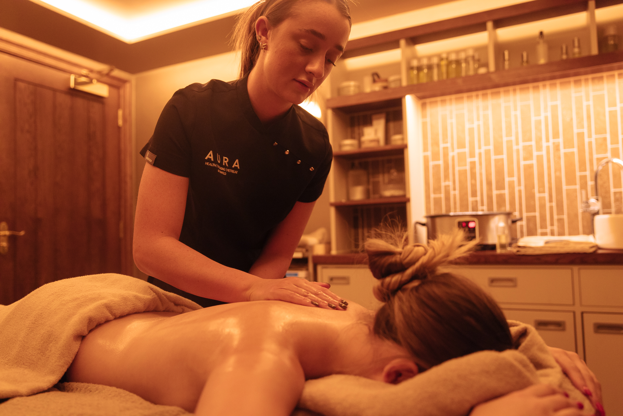 woman enjoying spa gift voucher at bowfield aura spa