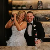 Couple mixing cocktails