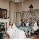 Bride getting dressed for her wedding day