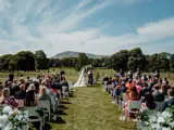 Couple having their ceremony outside at Cornhill Castle