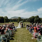 Couple having their ceremony outside at Cornhill Castle