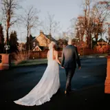 Couple walking outside of Boclair House