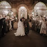 Couple walking through sparklers
