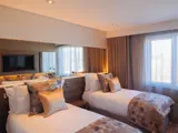 Twin room with made beds