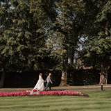 newly married couple taking a walk in boclair house gardens