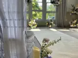 chair and flowers at a tarbet loch lomond wedding