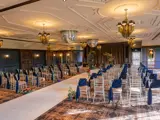 Blue chair settings and Aisle ready for ceremony